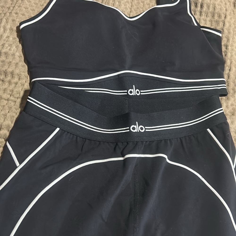 ALO Yoga Black and White Bodysuit with Retro-Inspired Design